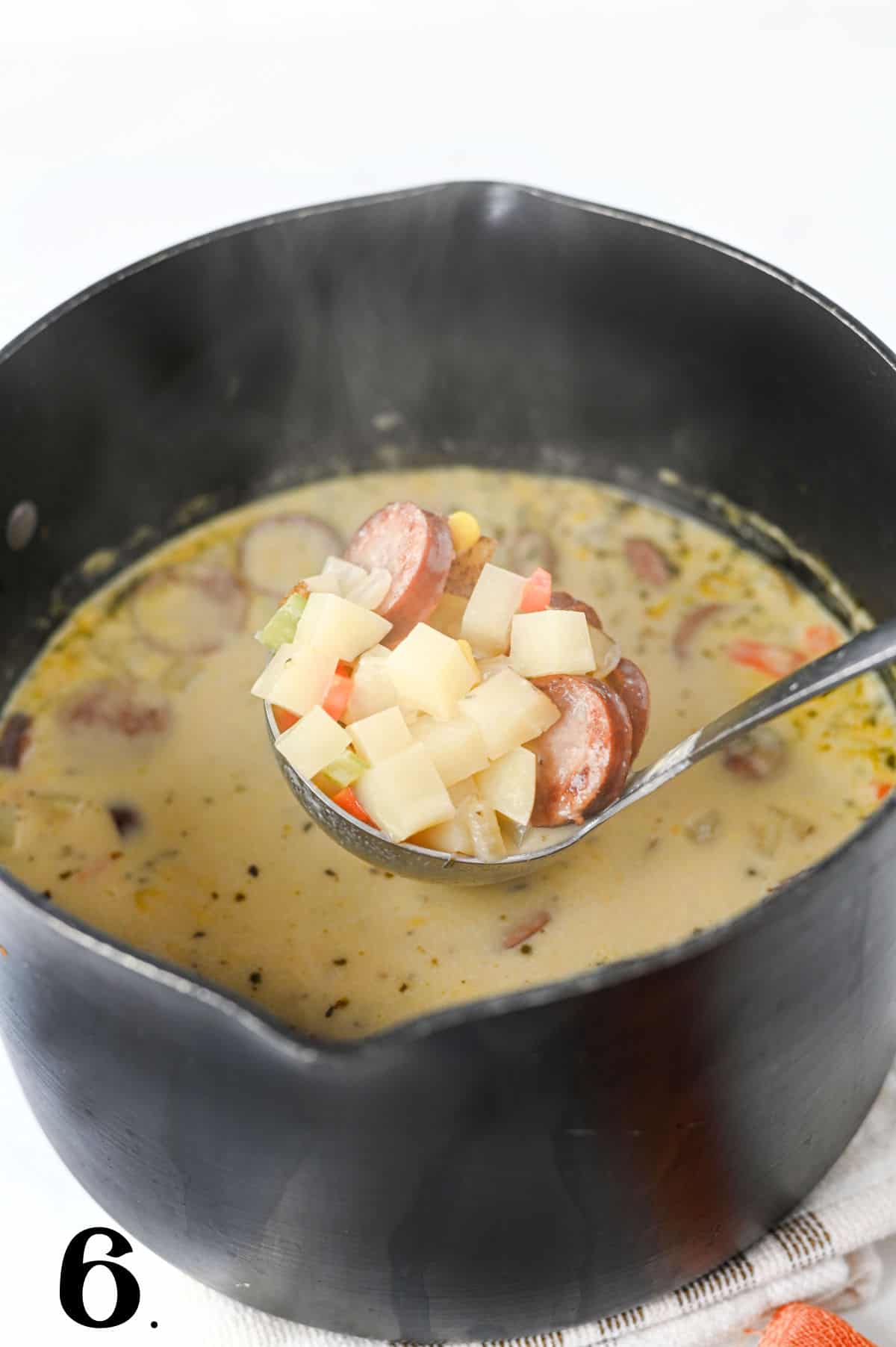 How to Make Kielbasa Potato Soup Step 6 - cooking until heated through.