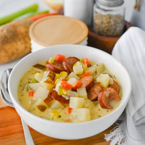 Kielbasa Potato Soup in white bowl.
