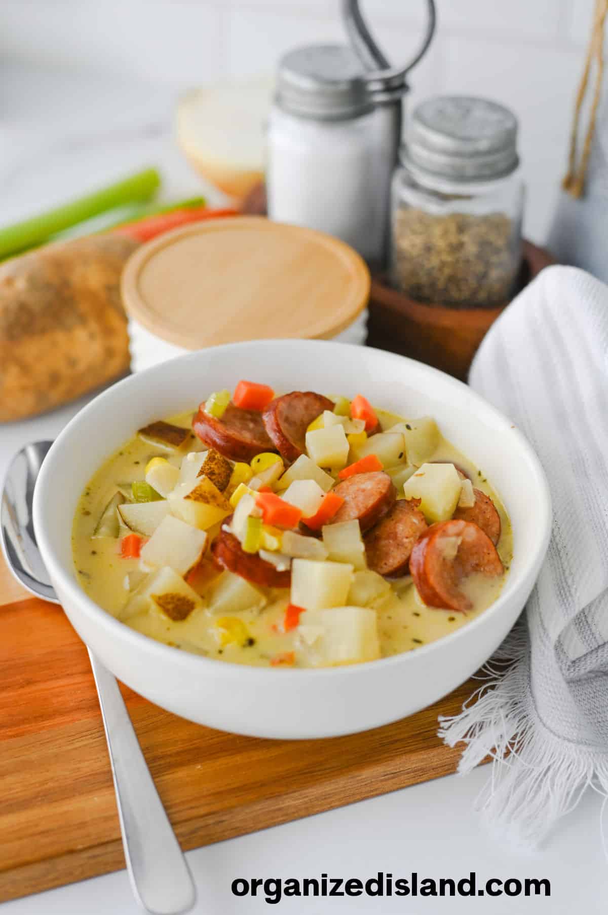 Kielbasa Potato Soup in white bowl.