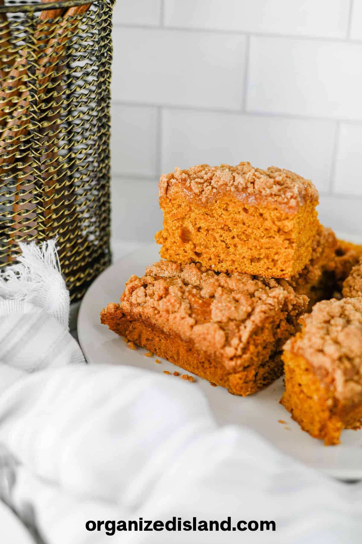 Easy Pumpkin Coffee Cake bars on plate.