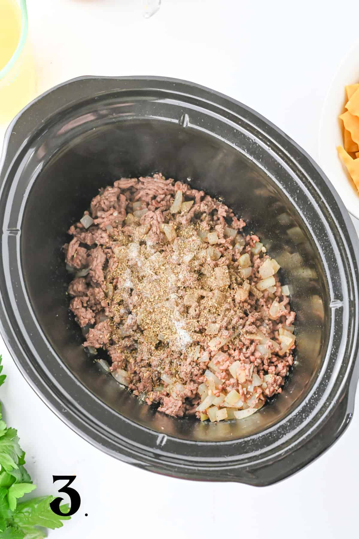 How to Make Crockpot Lasagna Soup Step 3 - adding seasonings.