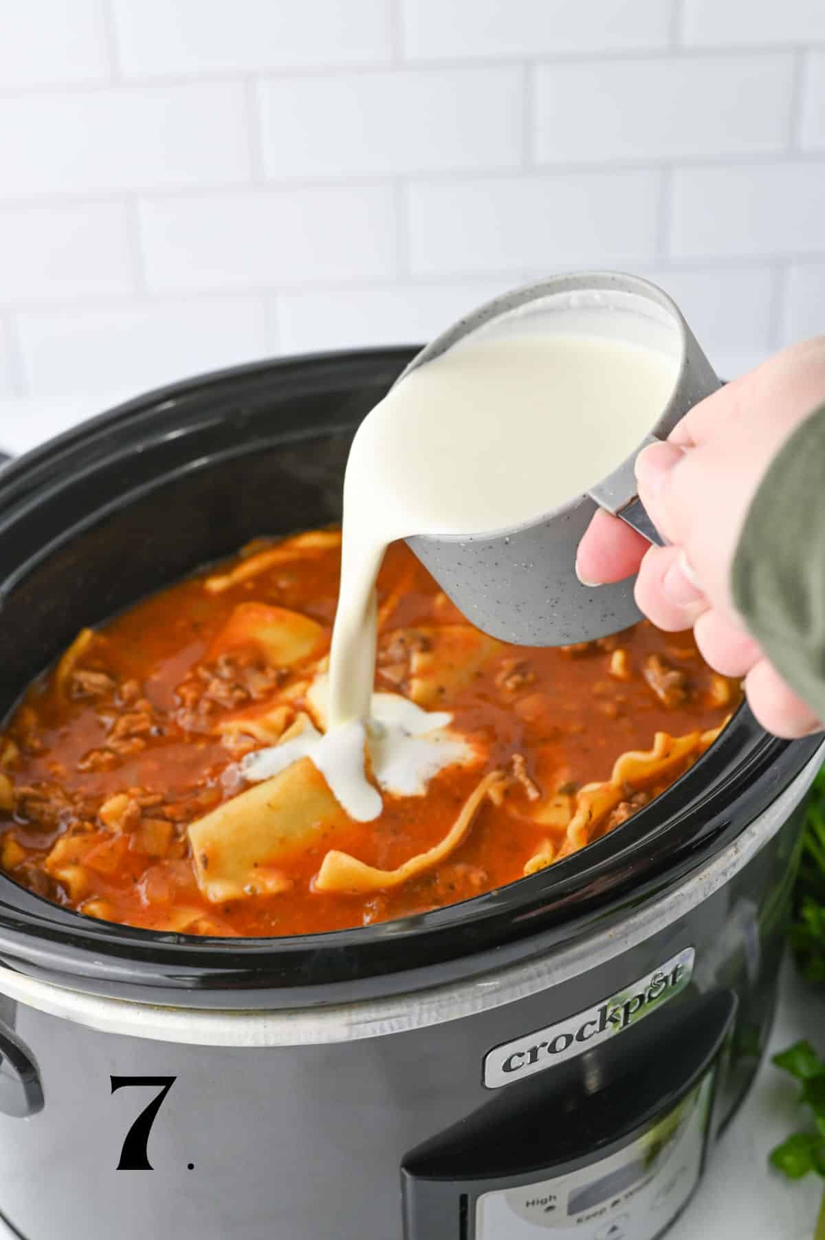 How to Make Crockpot Lasagna Soup Step 7 - adding cream.