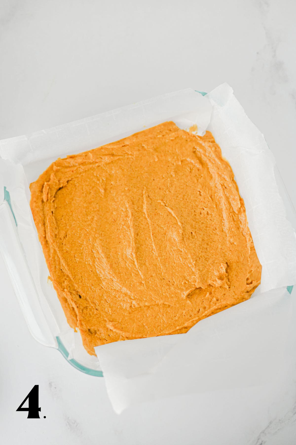 How to Make Pumpkin Coffee Cake Step 4 - pouring batter into pan.