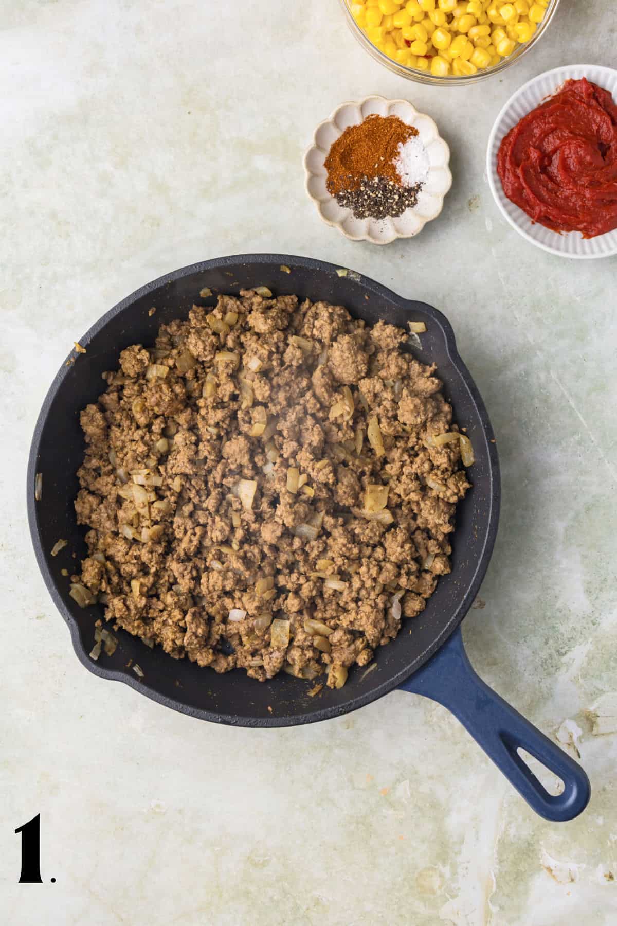 How to Make Shepherd's Pie - Step 1 browning ground beef in skillet.