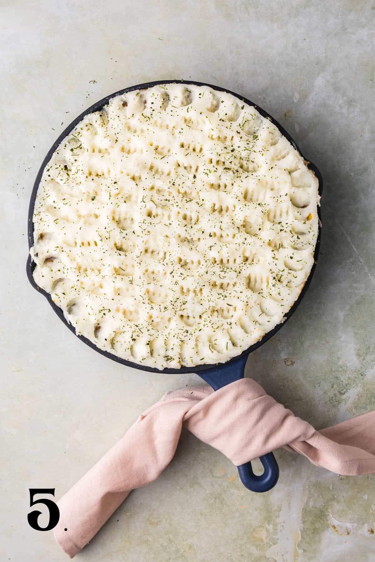 How to Make Shepherd's Pie - Step 5 with potato dollaps.