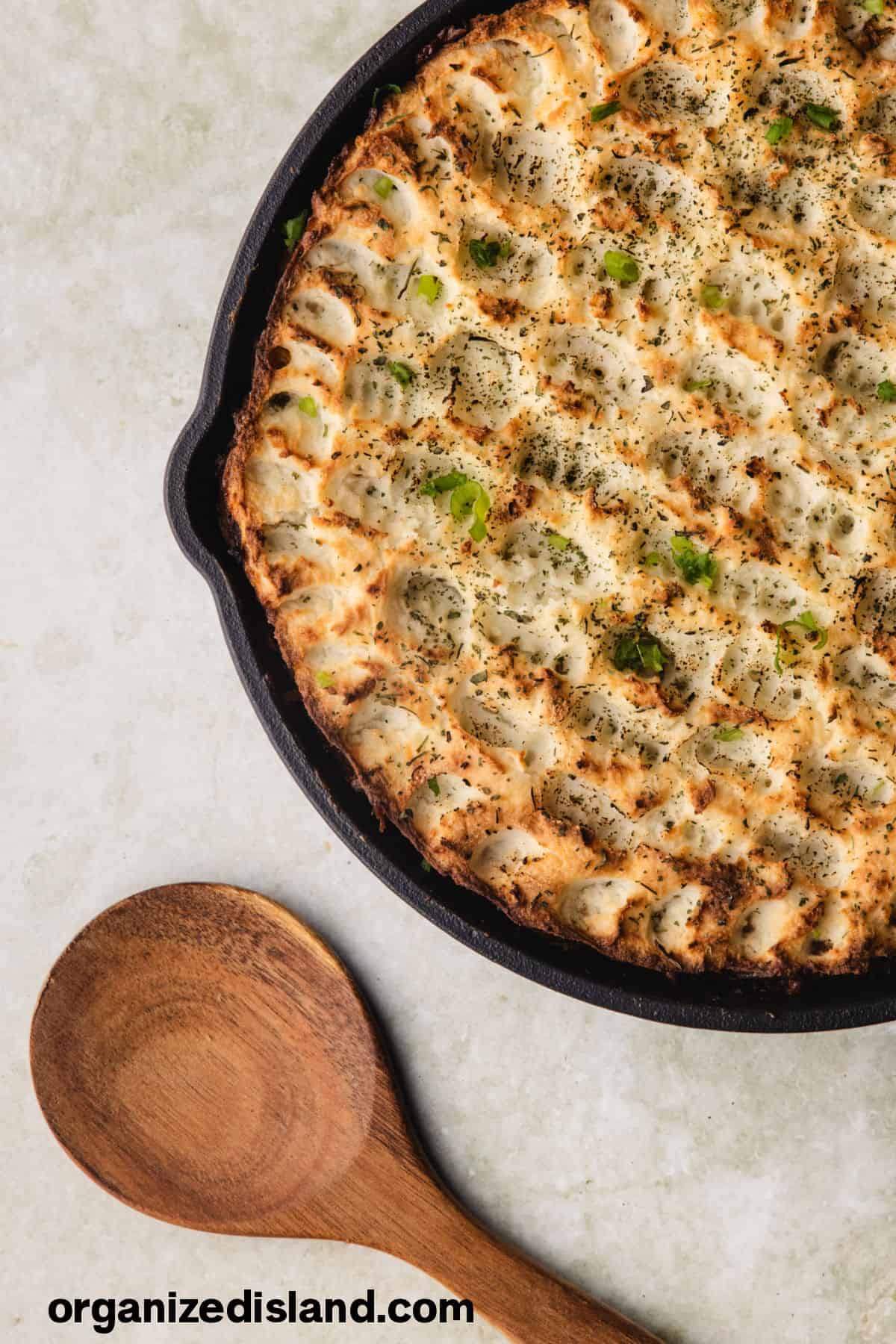 Simple Shepherds Pie baked in cast iron skillet.