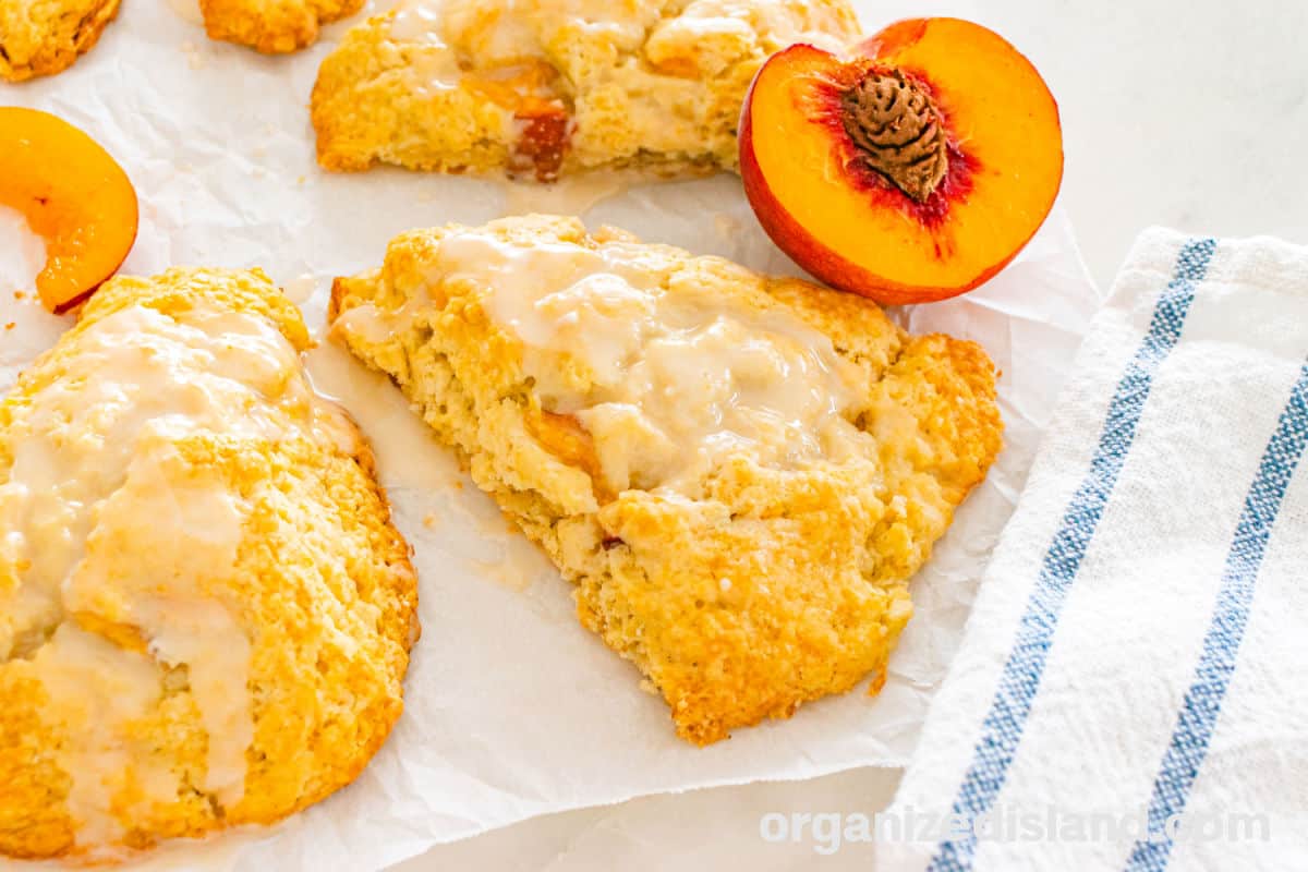 Tea Party Peach Scones with half peach next to scones.