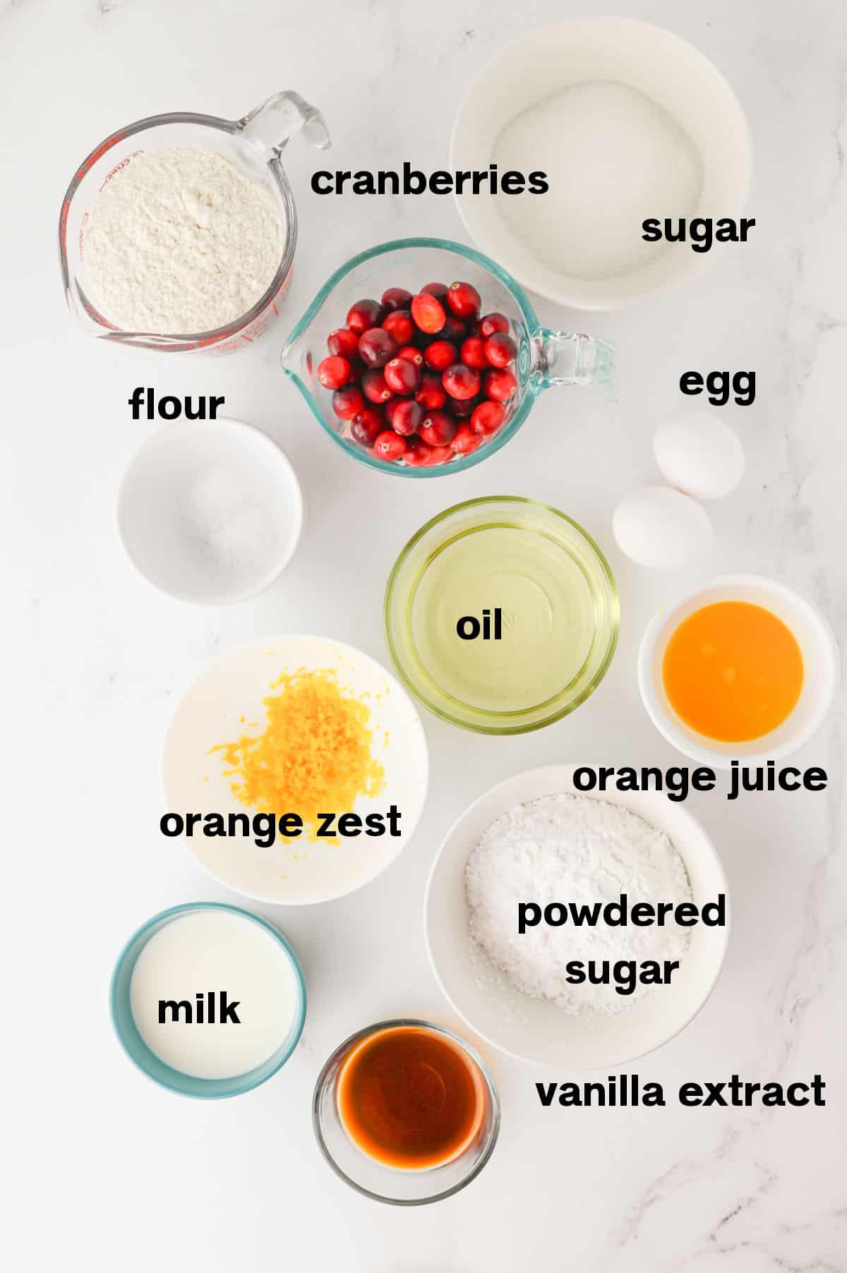 Cranberry Orange Muffins Ingredients on counter.