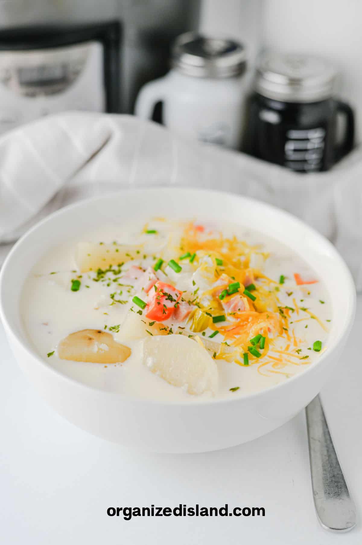 Crockpot Ham and Potato Soup in bowl.