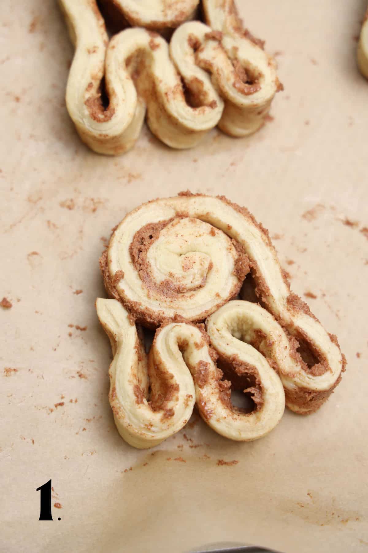 How to Make Cinnamon Roll Ghosts - Step 1 - shape before baking.