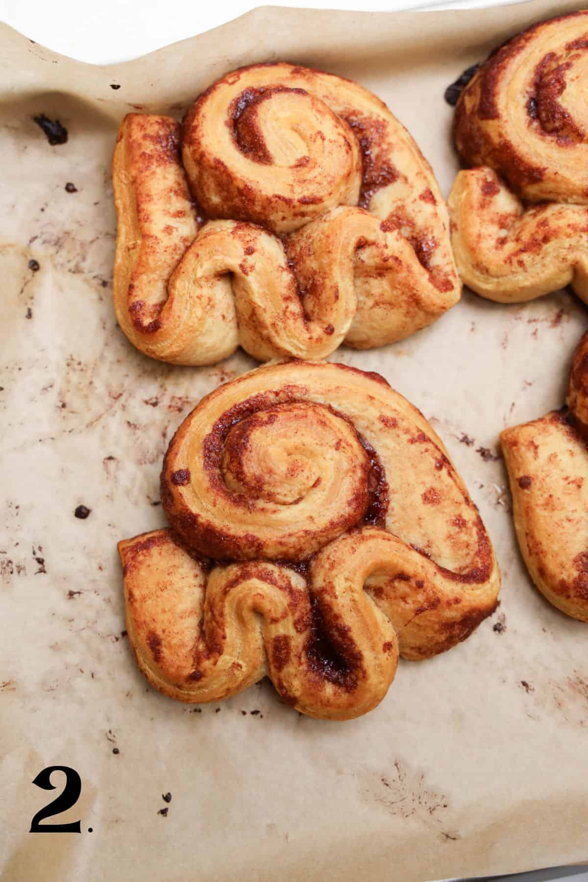 How to Make Cinnamon Roll Ghosts - Step 2 - bake as directed.