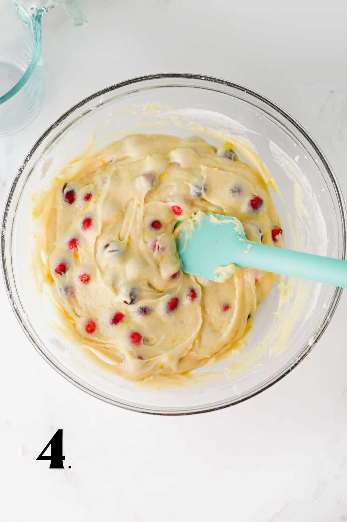 How to Make Cranberry Orange Muffins - Step 4 - adding cranberries to batter.