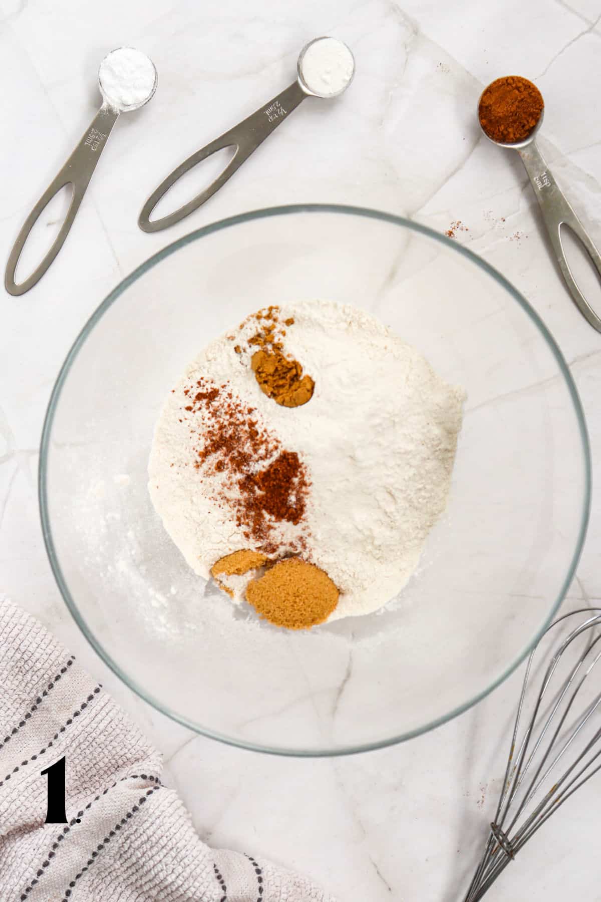 - mixing dry ingredients in bowl.How to Make Pumpkin Waffles Step 1
