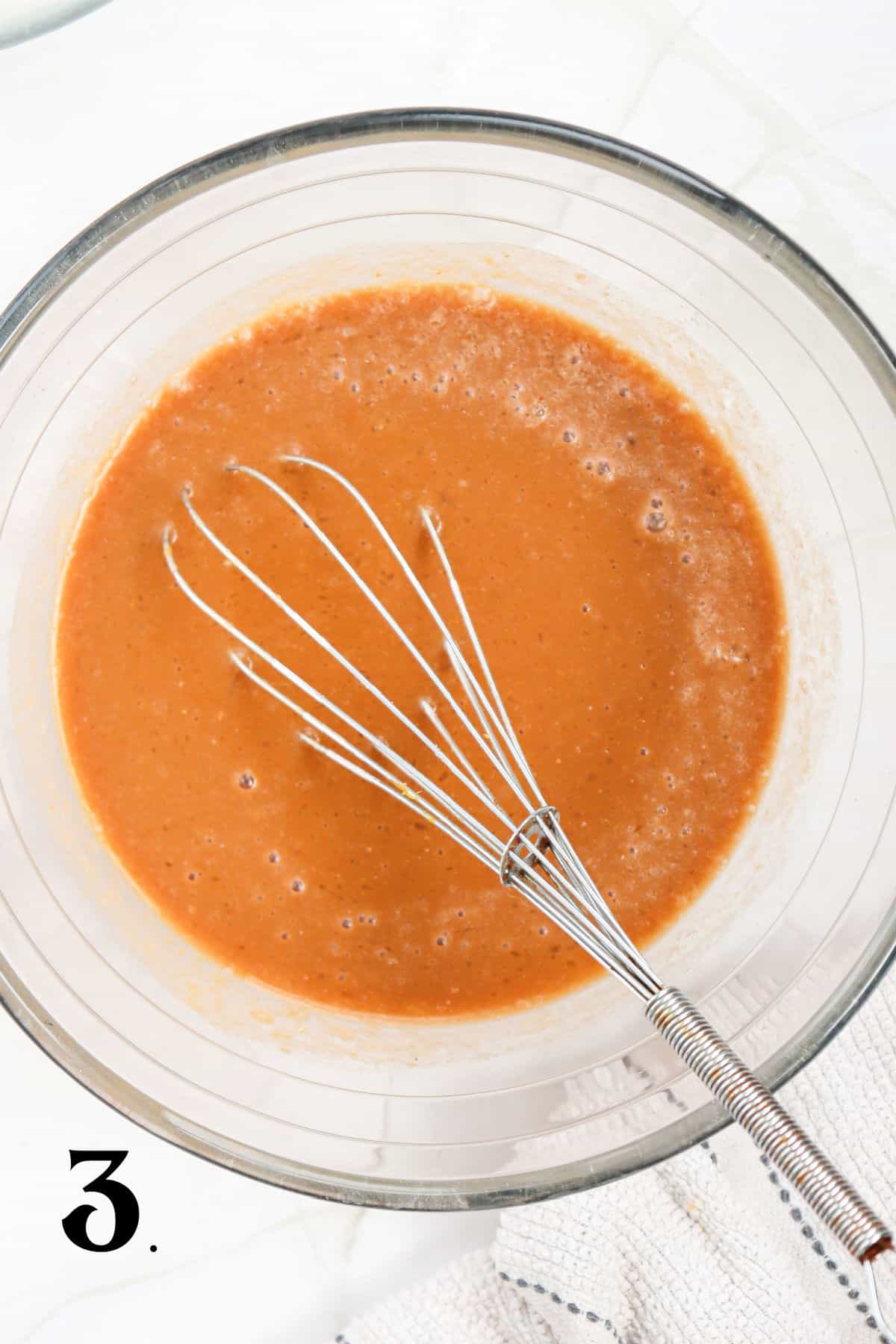 How to Make Pumpkin Waffles Step 3 - mixing wet ingredients in bowl.