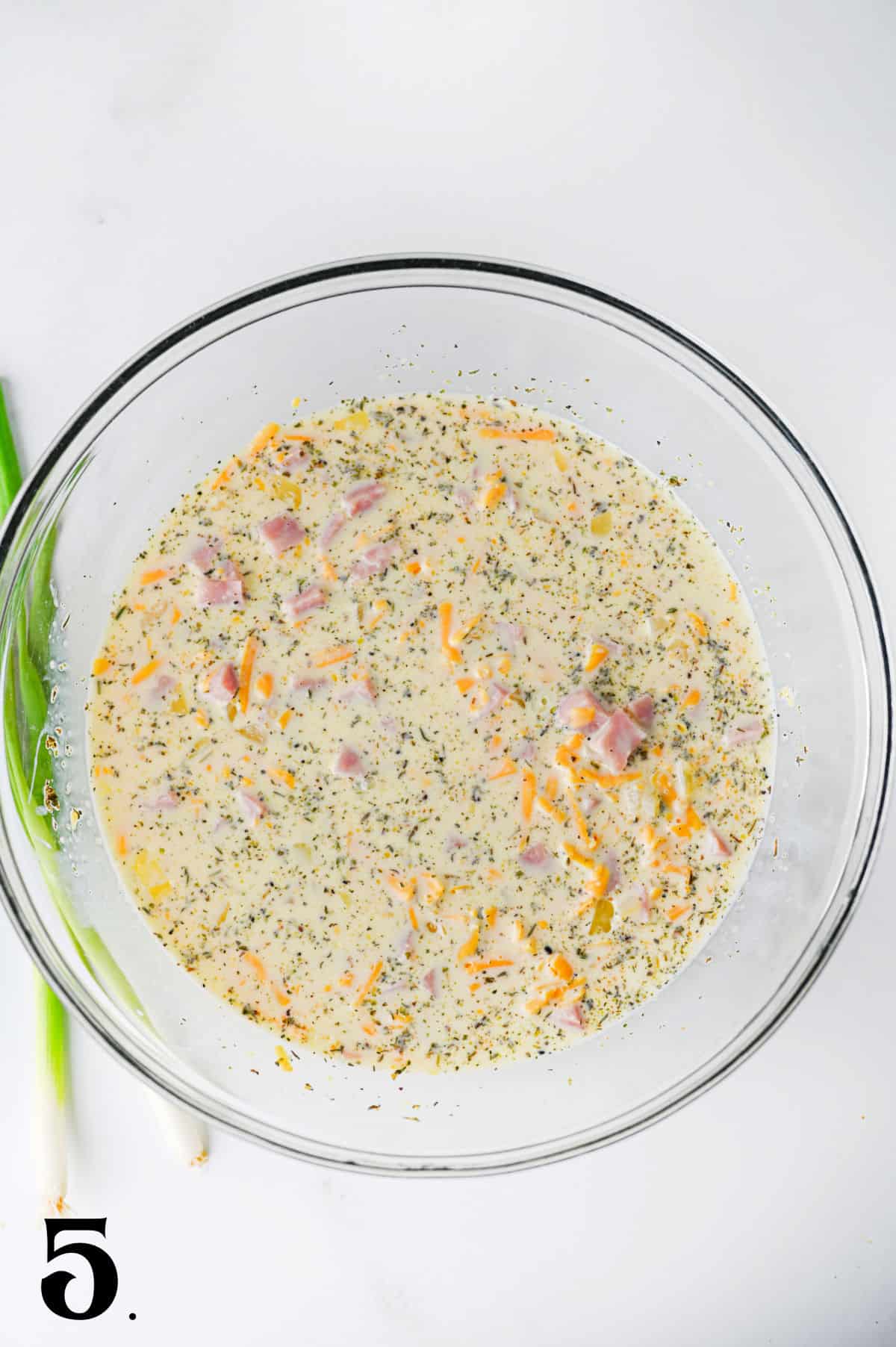 How to make a Ham and Cheese Quiche Step 5 - egg mixture in bowl.