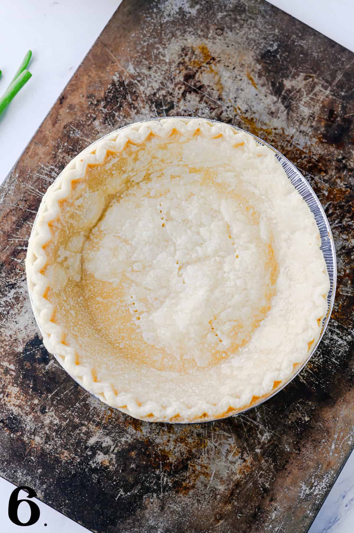 How to make a Ham and Cheese Quiche Step 6 - prepped pie shell.