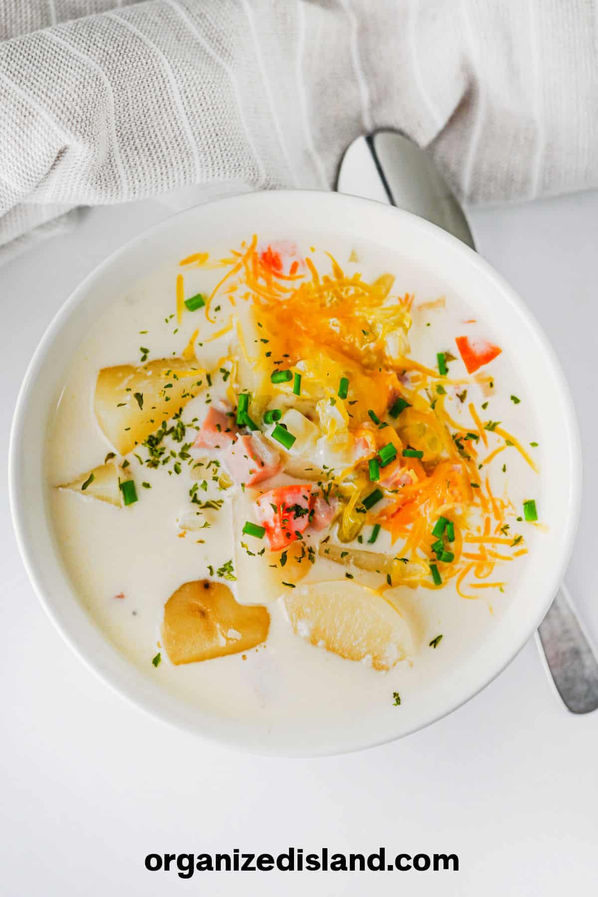 Easy Slow Cooker Ham and Potato Soup Recipe - bowl of soup from above.