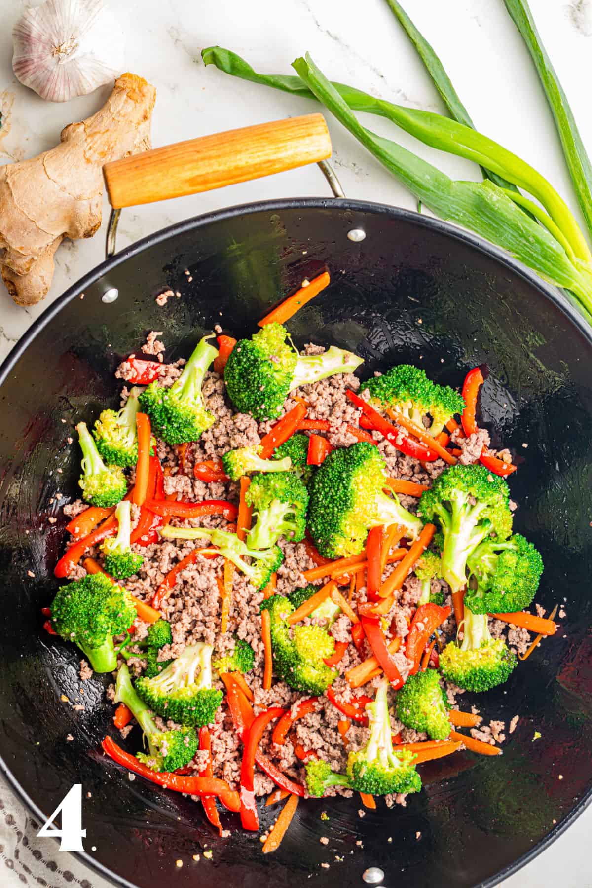 How to Make Ground Beef Stir Fry Step 4 - add beef back to pan.