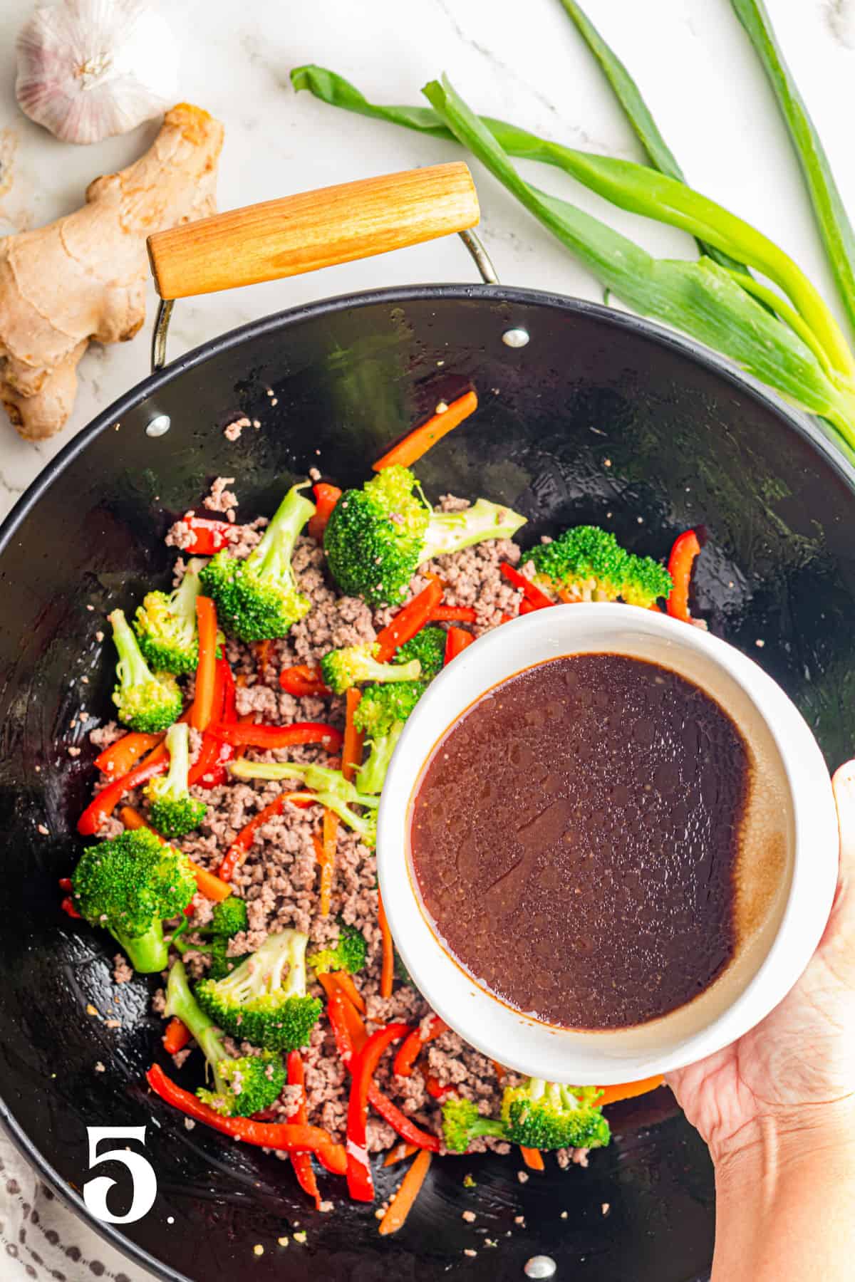 How to Make Ground Beef Stir Fry Step 5 - add the sauce.