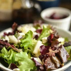 Grab a bag of greens and add some cranberries, pears and feta cheese to create this wonderful fall salad.