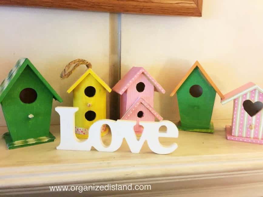 Cute craft idea decorating bird houses using wooden bird houses , scrapbook paper and washi tape!
