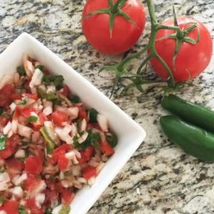 This easy chunky salsa recipe makes a great condiment all year round. Perfect for an appetizer or with fish and steak!