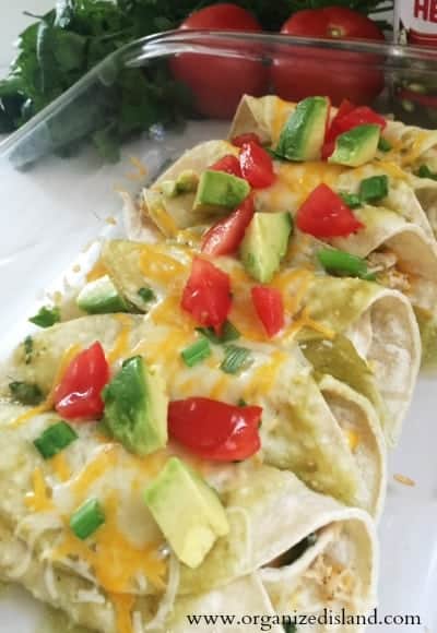 Easy Chili Verde Enchiladas is a recipe made with green chilies, chicken and cheese!