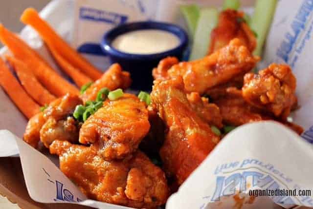Try the honey-sriracha chicken wings at Islands Fine Burgers and Drinks . So tasty and tangy!