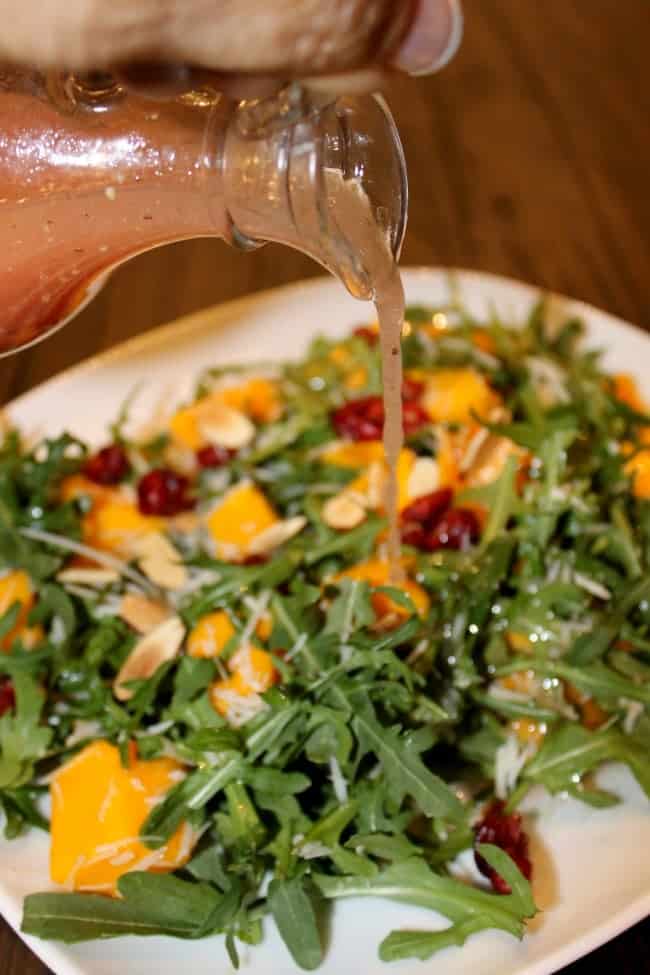 Simple and easy Mango Arugula salad recipe that is perfect for spring and summer!