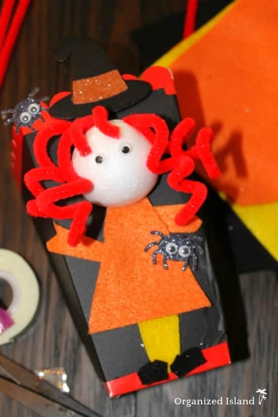 A cute Halloween Party Favor Idea Popcorn Box - A Decorated Popcorn Box for popcorn and other sweet treats!