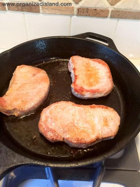Skillet Pork Chops made in a single pan. Juicy and tender with a tangy sauce!