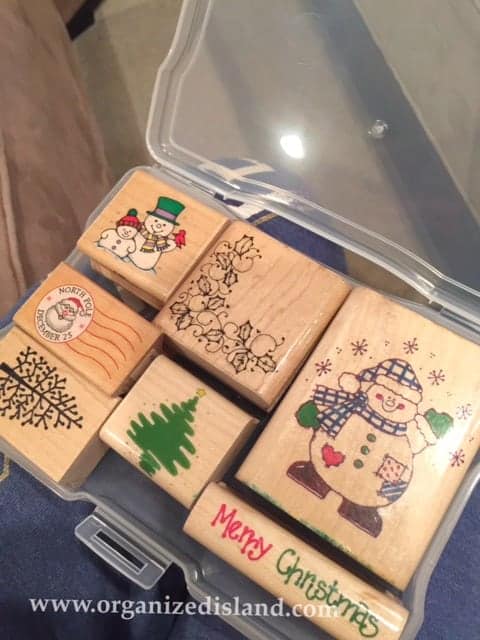 See how I organized my rubber stamps by repurposing a photo box!