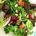 This simple spring greens salad recipe is so tasty and easy to make. With feta cheese and bacon, it is filled with flavor!