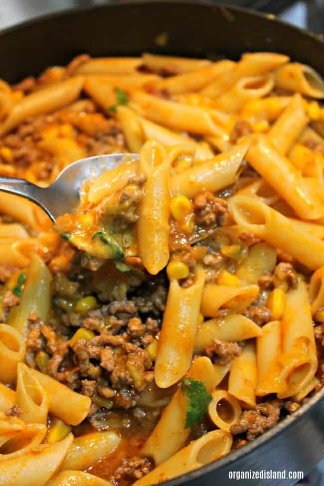 Taco pasta with ground beef comes together in one skillet for a simple weeknight dinner idea.